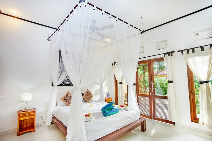 Imagen de la habitación del Hotel Taos House Lembongan. Foto 18