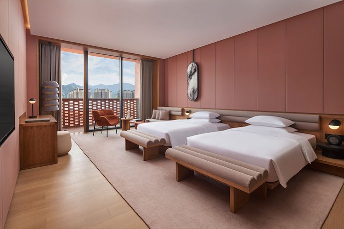 Imagen de la habitación del Hotel Taoxichuan Hotel. Foto 10