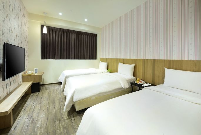Imagen de la habitación del Hotel Taoyuan Hedo Hotel. Foto 2