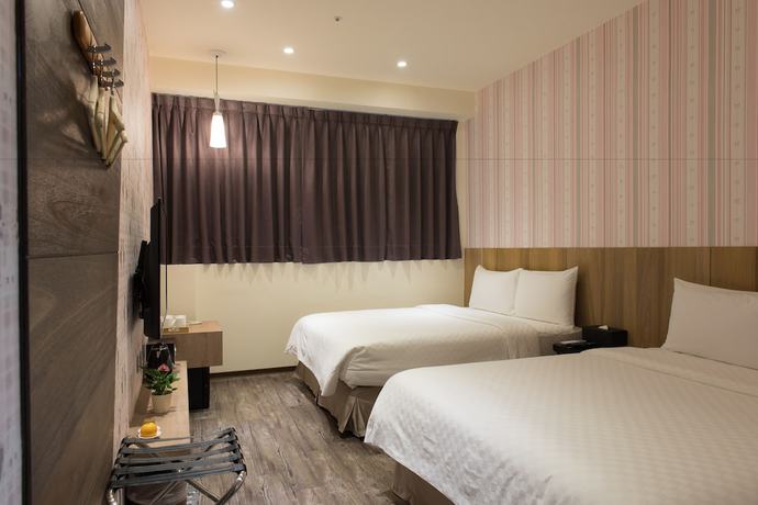 Imagen de la habitación del Hotel Taoyuan Hedo Hotel. Foto 6