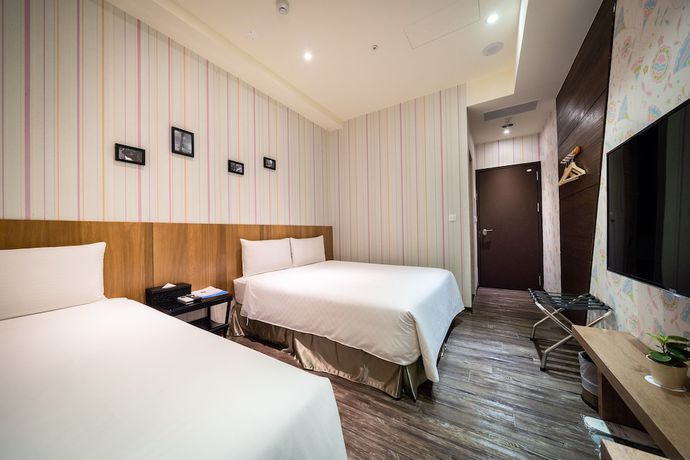 Imagen de la habitación del Hotel Taoyuan Hedo Hotel. Foto 8