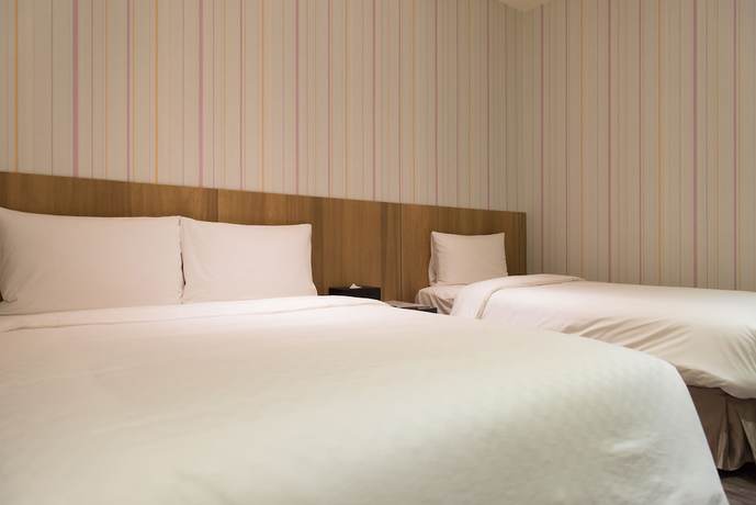 Imagen de la habitación del Hotel Taoyuan Hedo Hotel. Foto 9
