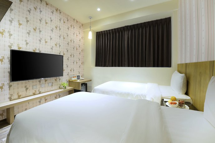 Imagen de la habitación del Hotel Taoyuan Hedo Hotel. Foto 10
