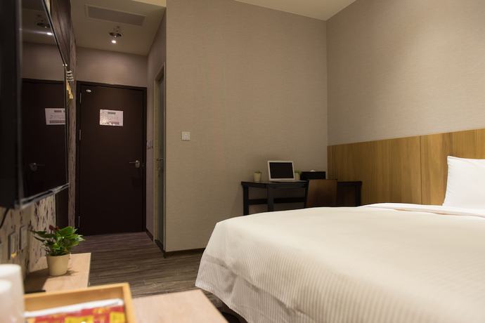 Imagen de la habitación del Hotel Taoyuan Hedo Hotel. Foto 11