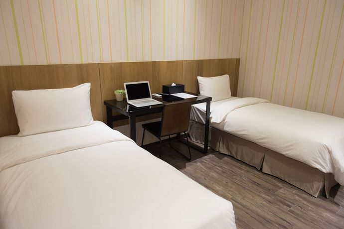 Imagen de la habitación del Hotel Taoyuan Hedo Hotel. Foto 12