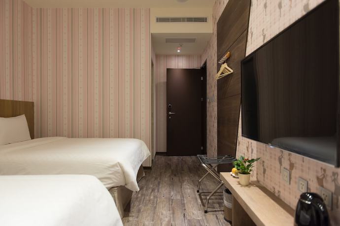 Imagen de la habitación del Hotel Taoyuan Hedo Hotel. Foto 13