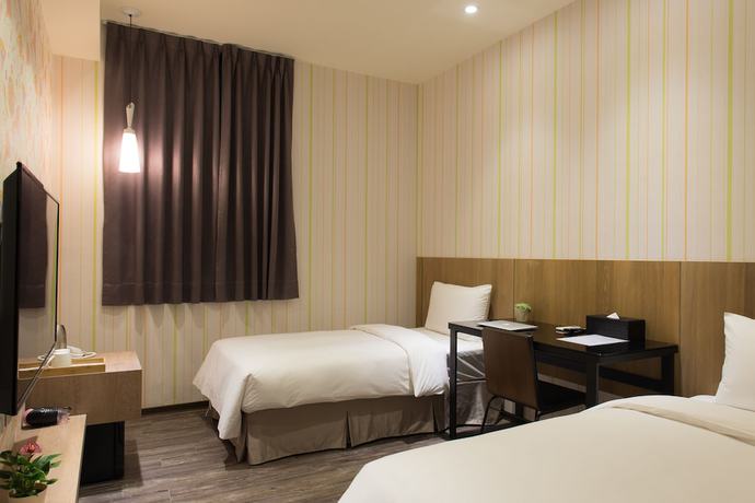 Imagen de la habitación del Hotel Taoyuan Hedo Hotel. Foto 17