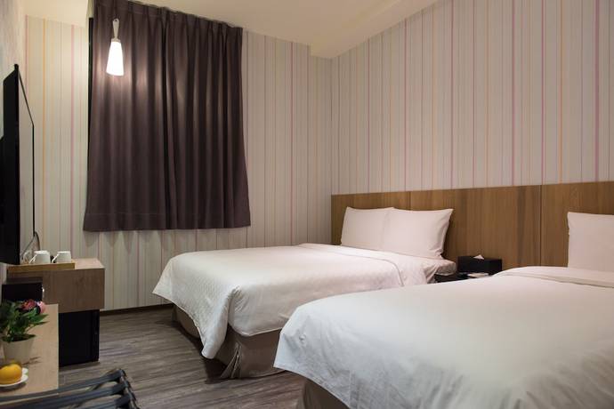 Imagen de la habitación del Hotel Taoyuan Hedo Hotel. Foto 19