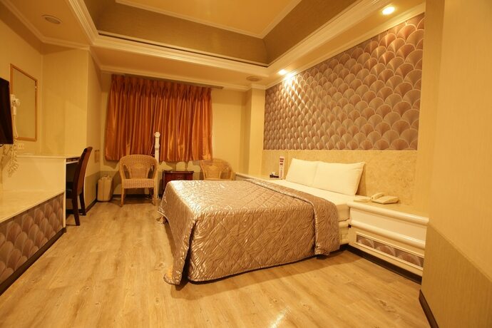 Imagen de la habitación del Hotel Taoyuan Hua Yue. Foto 16