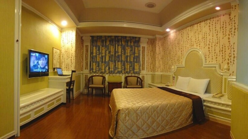 Imagen de la habitación del Hotel Taoyuan Hua Yue. Foto 19
