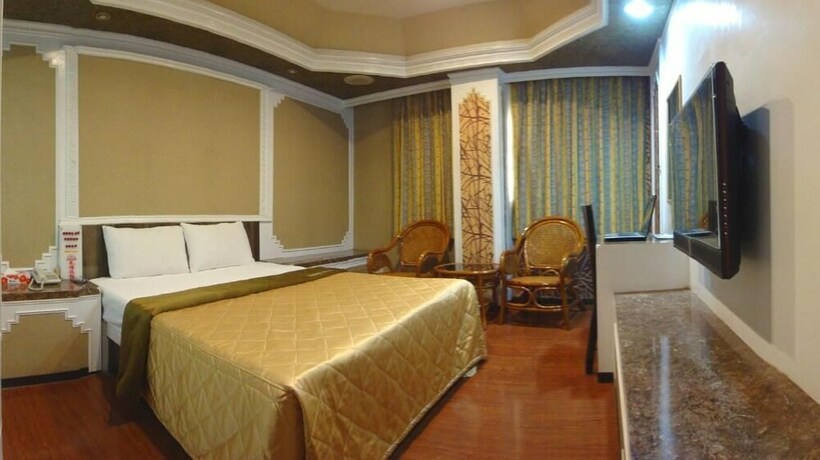 Imagen de la habitación del Hotel Taoyuan Hua Yue. Foto 23