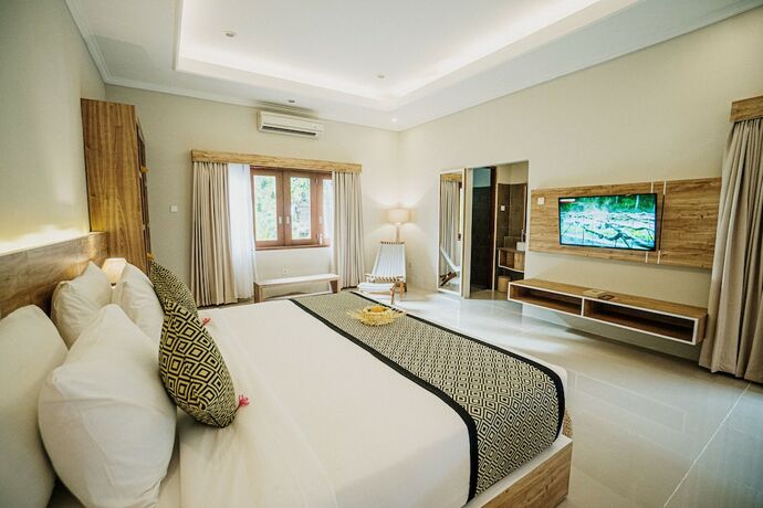 Imagen de la habitación del Hotel Tapa Tepi Kali. Foto 20