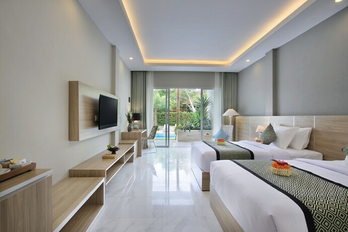 Imagen de la habitación del Hotel Tapa Tepi Kali. Foto 23