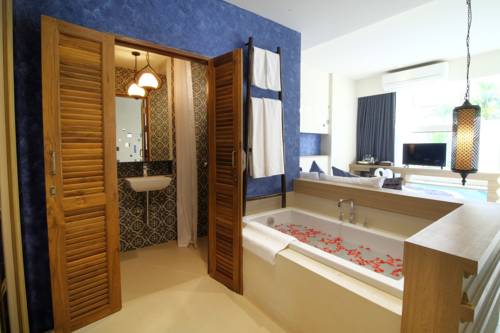 Imagen de la habitación del Hotel Tapae Gate Villa. Foto 3