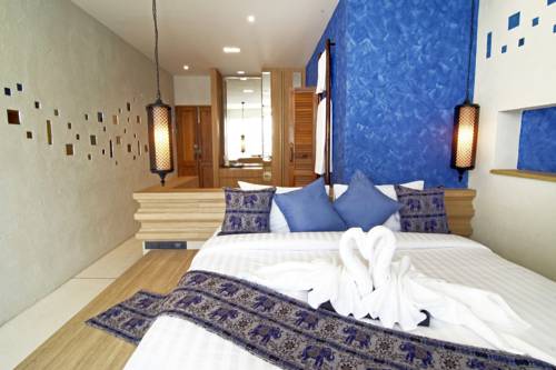 Imagen de la habitación del Hotel Tapae Gate Villa. Foto 4