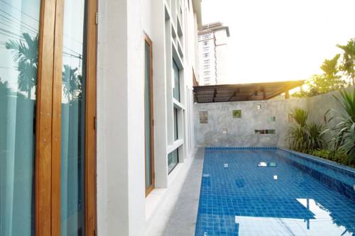 Imagen de la habitación del Hotel Tapae Gate Villa. Foto 9