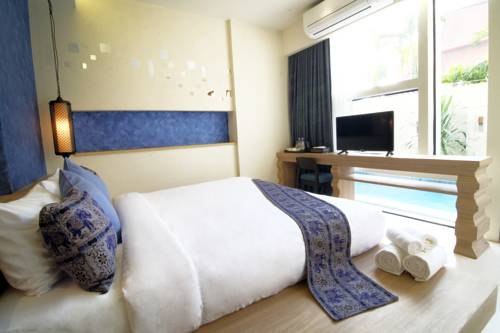 Imagen de la habitación del Hotel Tapae Gate Villa. Foto 13