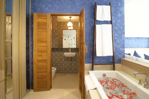 Imagen de la habitación del Hotel Tapae Gate Villa. Foto 16