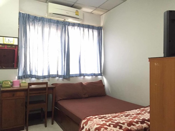 Imagen de la habitación del Hotel Tapae Inn. Foto 13