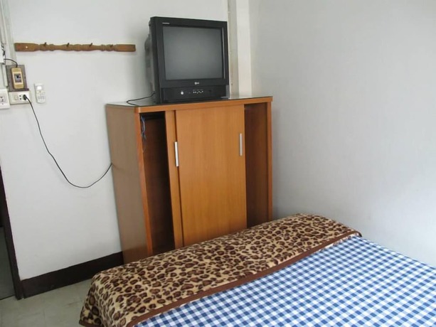 Imagen de la habitación del Hotel Tapae Inn. Foto 14