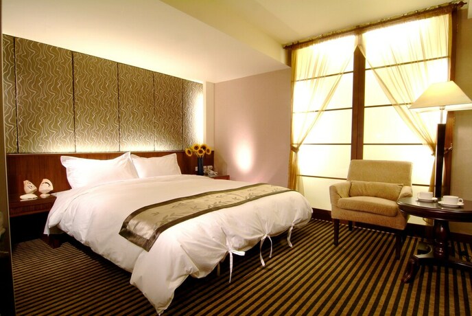 Imagen de la habitación del Hotel Tapeng Bay Holiday. Foto 16