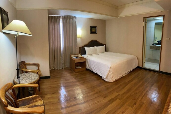 Imagen de la habitación del Hotel Tapeng Bay Holiday. Foto 17