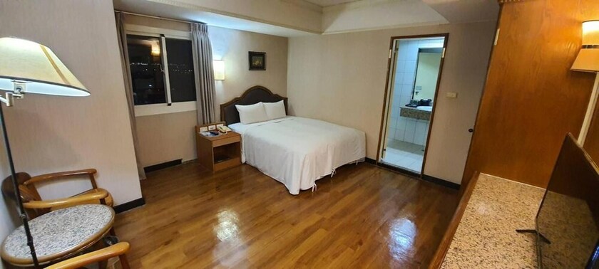 Imagen de la habitación del Hotel Tapeng Bay Holiday. Foto 18