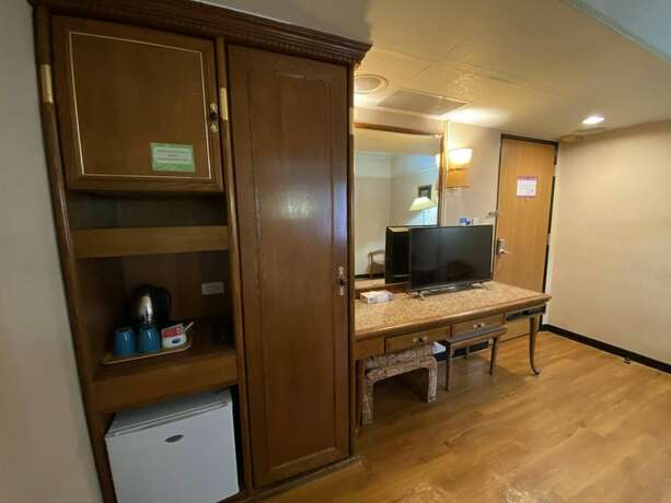 Imagen de la habitación del Hotel Tapeng Bay Holiday. Foto 19
