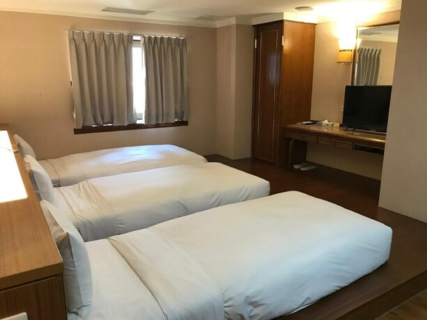 Imagen de la habitación del Hotel Tapeng Bay Holiday. Foto 22