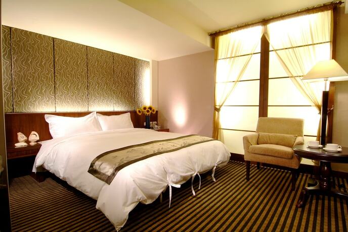 Imagen de la habitación del Hotel Tapeng Bay Holiday. Foto 24