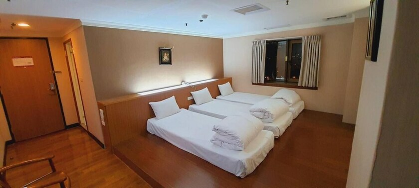 Imagen de la habitación del Hotel Tapeng Bay Holiday. Foto 25