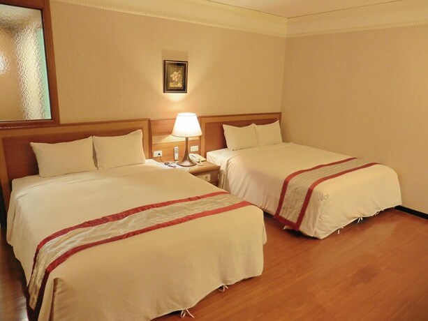 Imagen de la habitación del Hotel Tapeng Bay Holiday. Foto 26