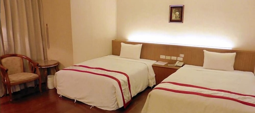 Imagen de la habitación del Hotel Tapeng Bay Holiday. Foto 28