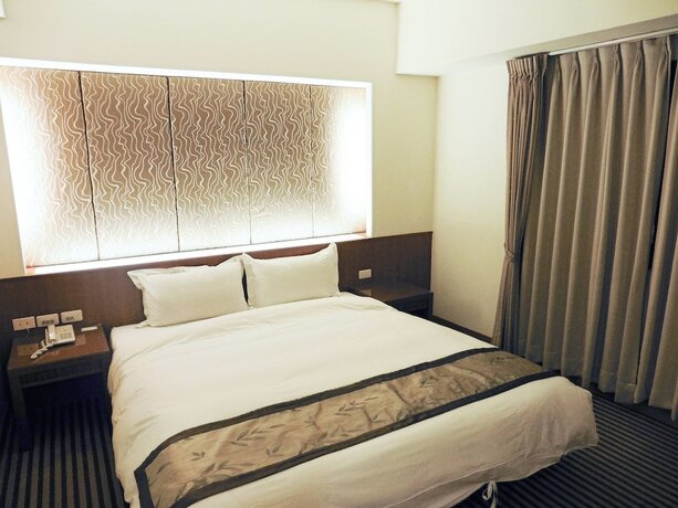 Imagen de la habitación del Hotel Tapeng Bay Holiday. Foto 29