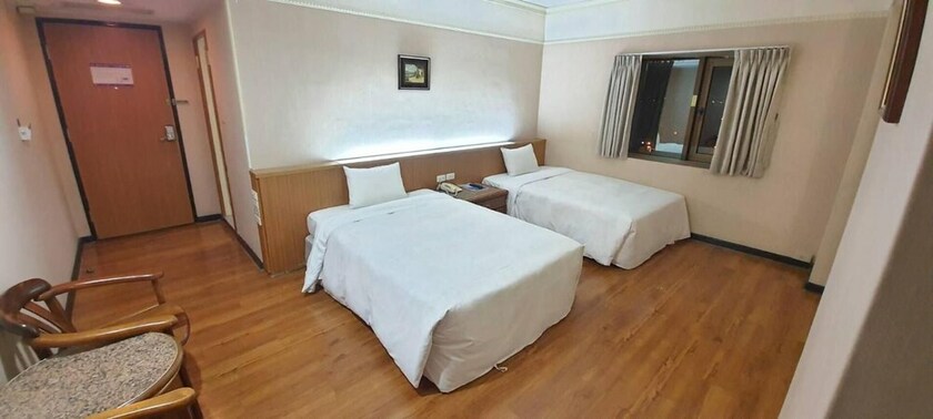 Imagen de la habitación del Hotel Tapeng Bay Holiday. Foto 30