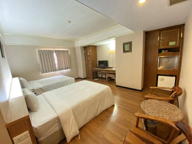 Imagen de la habitación del Hotel Tapeng Bay Holiday. Foto 31