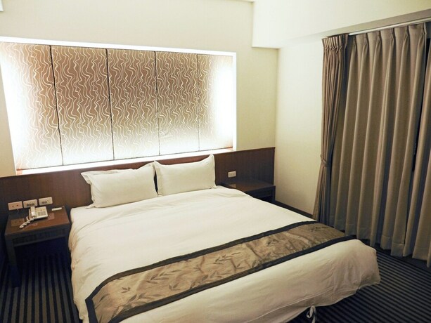 Imagen de la habitación del Hotel Tapeng Bay Holiday. Foto 32