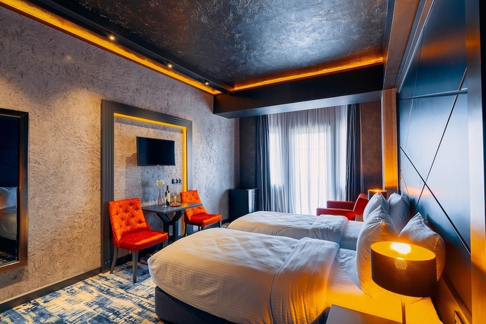 Imagen de la habitación del Hotel Tapis Rouge Design Boutique. Foto 6