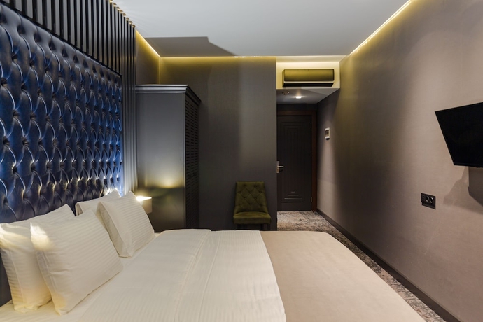 Imagen de la habitación del Hotel Tapis Rouge Design Boutique. Foto 11