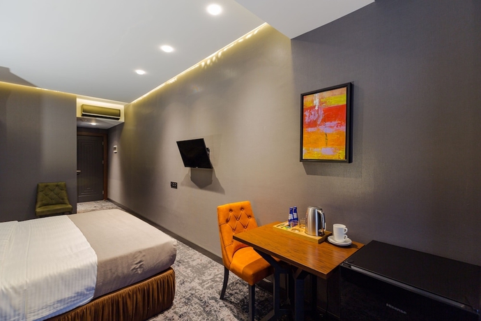Imagen de la habitación del Hotel Tapis Rouge Design Boutique. Foto 15