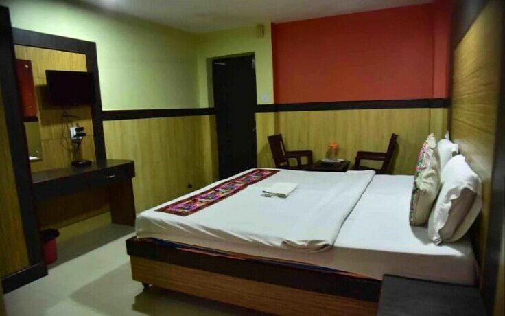 Imagen de la habitación del Hotel Tara Residency. Foto 10