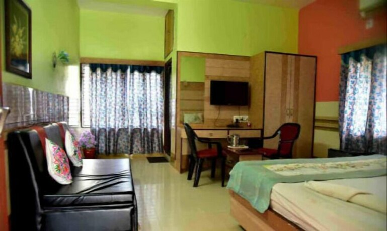 Imagen de la habitación del Hotel Tara Residency. Foto 13