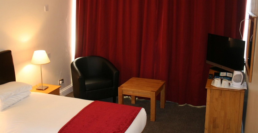 Imagen de la habitación del Hotel Tara Towers. Foto 6