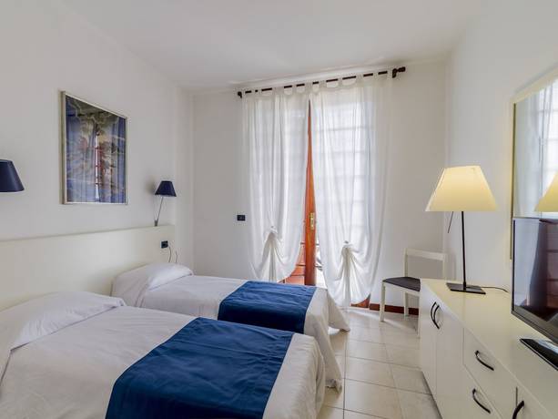 Imagen de la habitación del Hotel Tarabella, Forte de Marmi. Foto 5