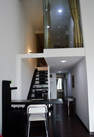 Imagen de la habitación del Hotel Taragon Residences. Foto 7