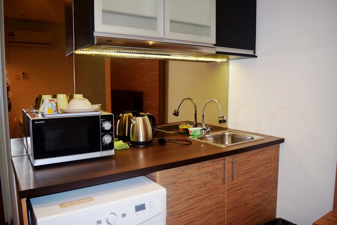 Imagen de la habitación del Hotel Taragon Residences. Foto 9