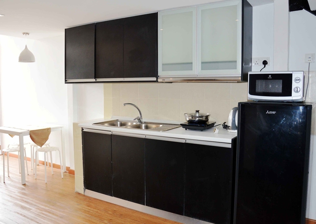 Imagen de la habitación del Hotel Taragon Residences. Foto 10