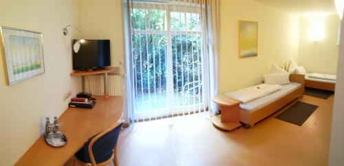 Imagen de la habitación del Hotel Taranga Tagungszentrum und. Foto 9