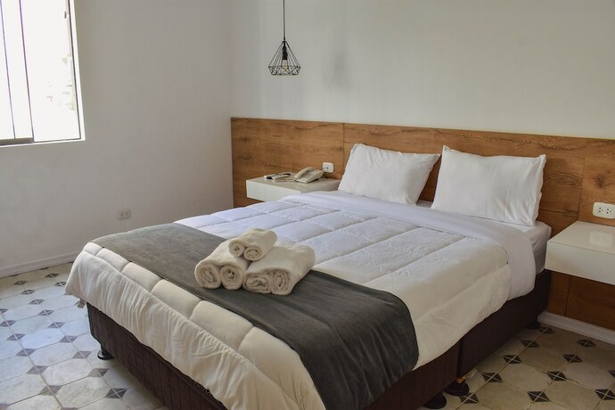 Imagen de la habitación del Hotel Tarata Boutique. Foto 17