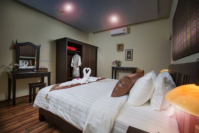 Imagen de la habitación del Hotel Taratai Villa. Foto 24